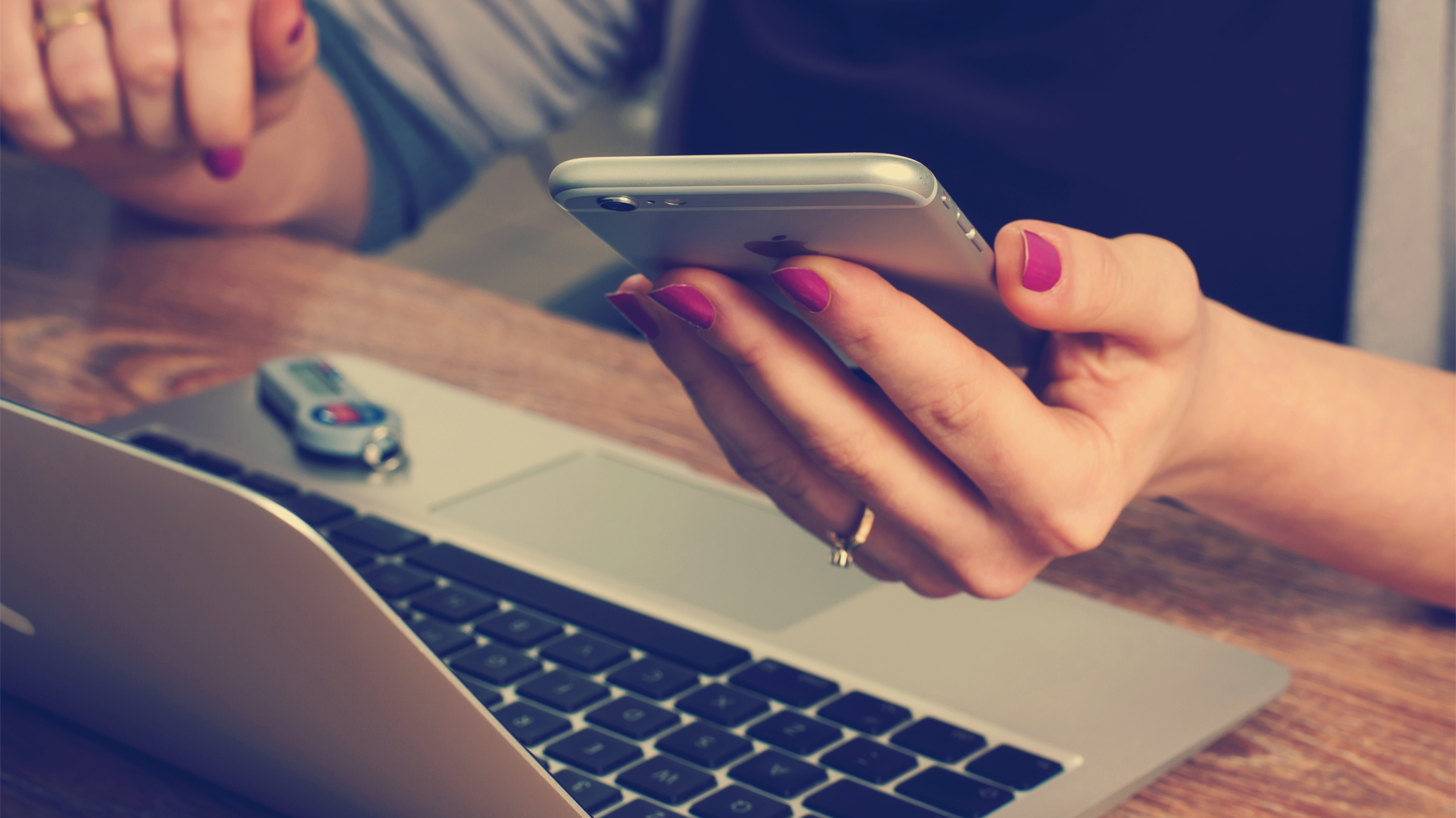 Woman holding mobile phone