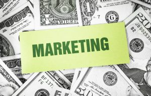 Bunch of dollars with marketing card